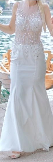 Poročna  čisto posebna obleka - nova - foto