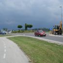 Rondo v Kranju pred merkatorjem in v uzadju vse bolj bližajoča se nevihta.